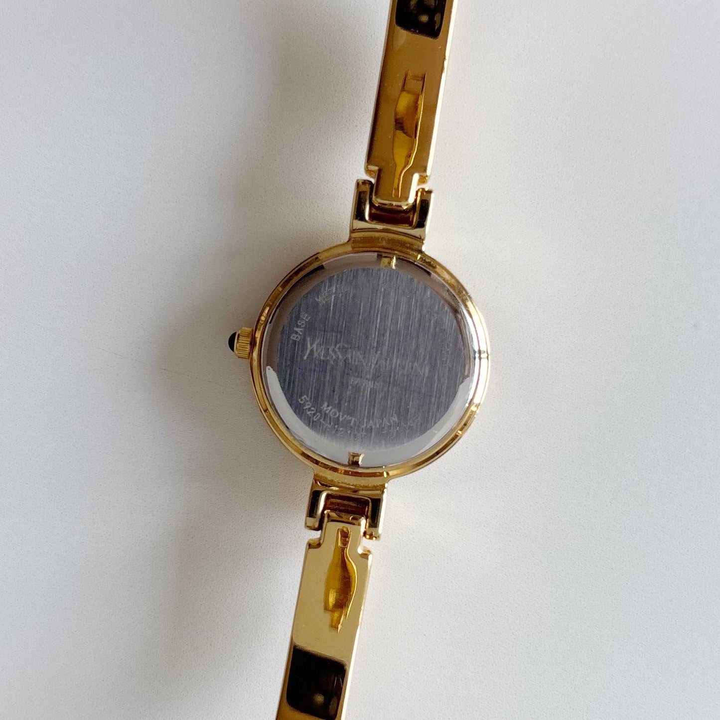 Yves Saint Laurent 1990s Black Round Dial Gold Plated Bangle Watch