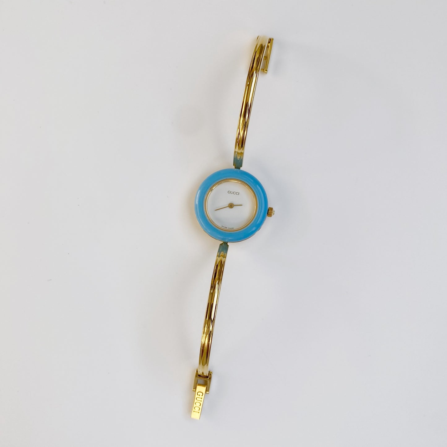 Gucci 1990s Interchangeable Bezel Gold Plated Bangle Watch with 12 bezels, case