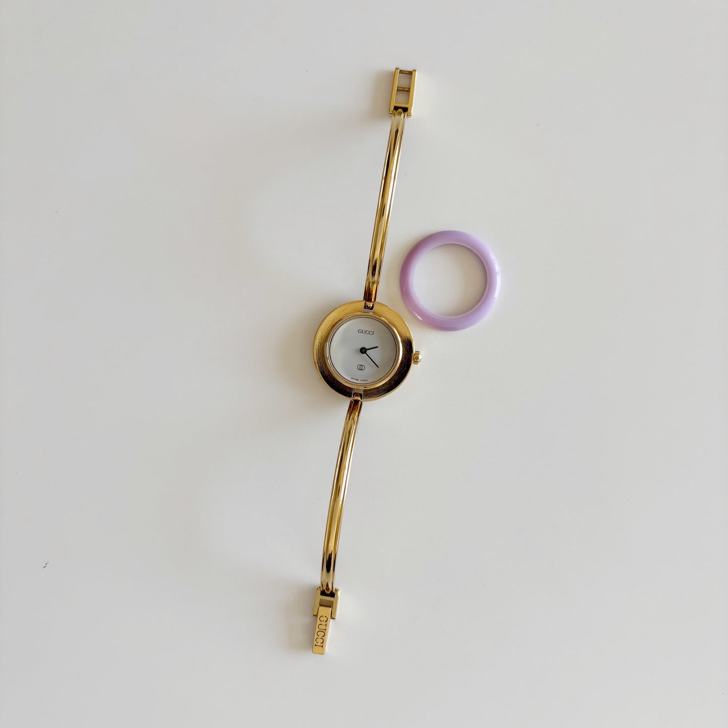 Gucci 1990s Interchangeable Bezel Gold Plated Bangle Watch with 12 bezels, case