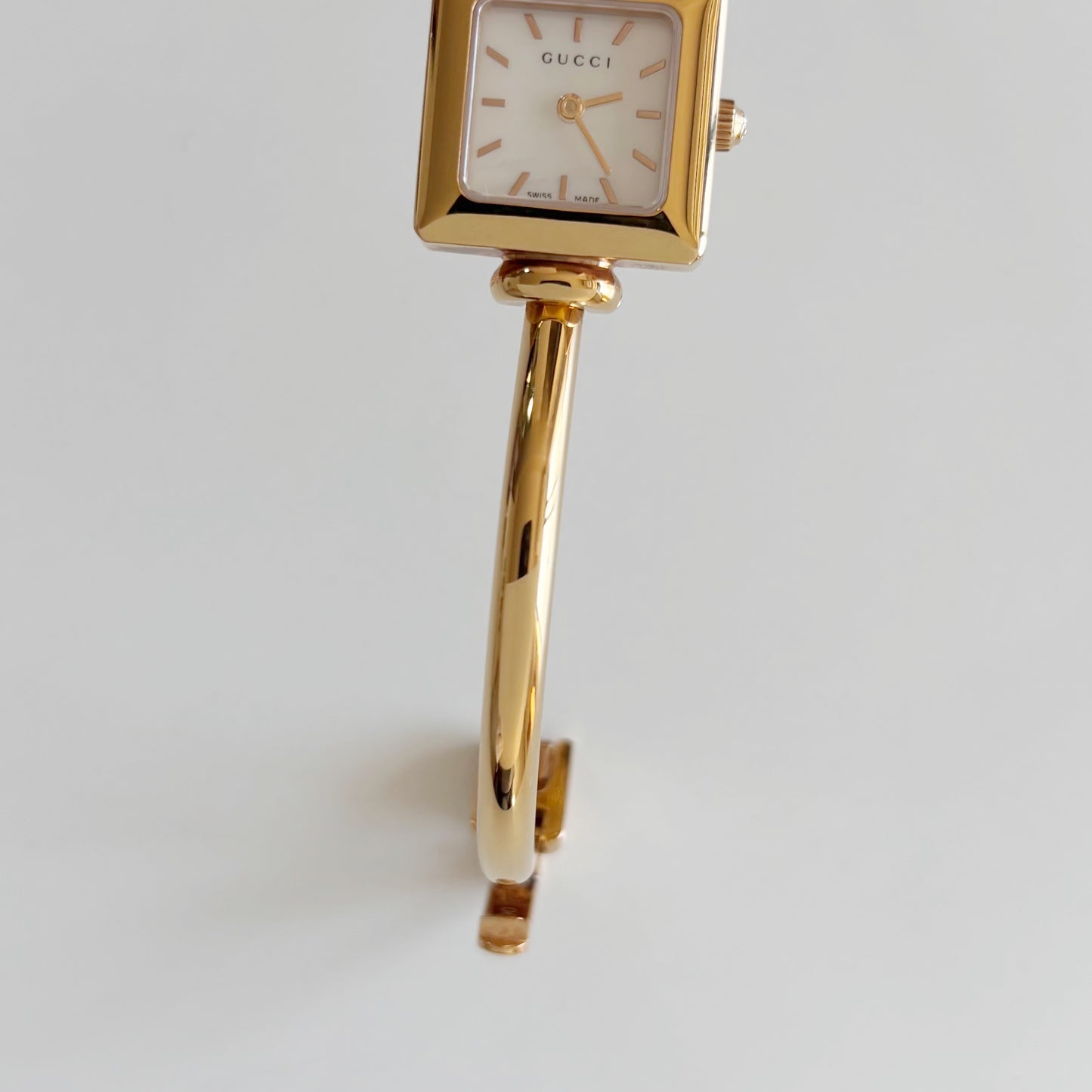 Gucci 1990s Seashell Square Dial Gold Plated Bangle Watch