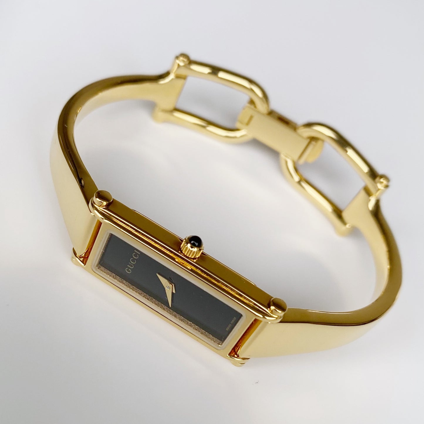 Gucci 1990s Black Dial Rectangular Gold Plated Bangle Watch