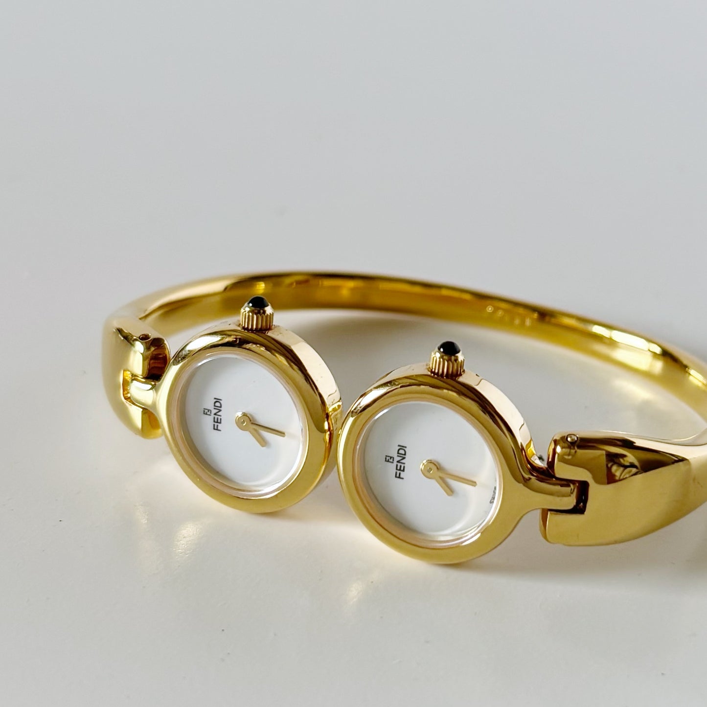 Fendi 1990s Seashell Dial Two Time Zone Gold Plated Bangle Watch