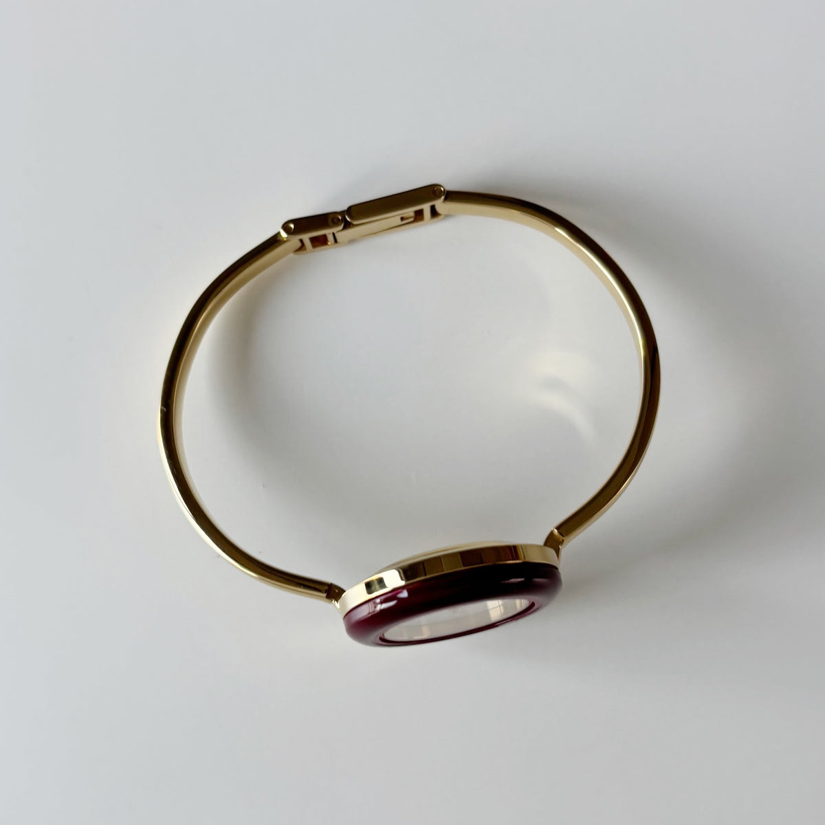 Gucci 1990s Interchangeable Bezel Gold Plated Bangle Watch with 12 bezels, case