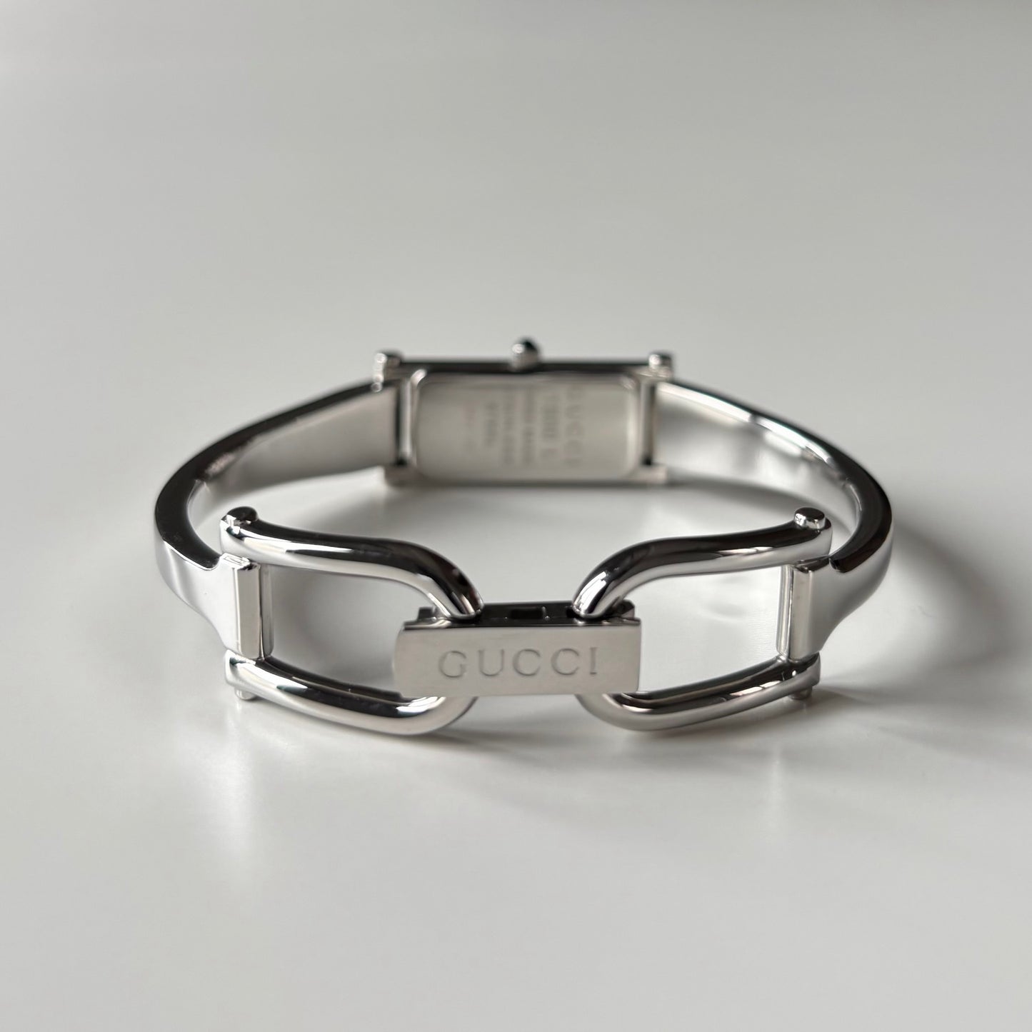 Gucci 1990s Rectangular Dial Silver Bangle Watch