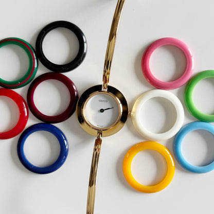 Gucci 1990s Interchangeable Bezel Gold Plated Bangle Watch with 12 bezels, case