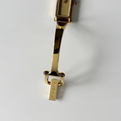 Gucci 1990s Gold Rectangular Dial Gold Plated Bangle Watch