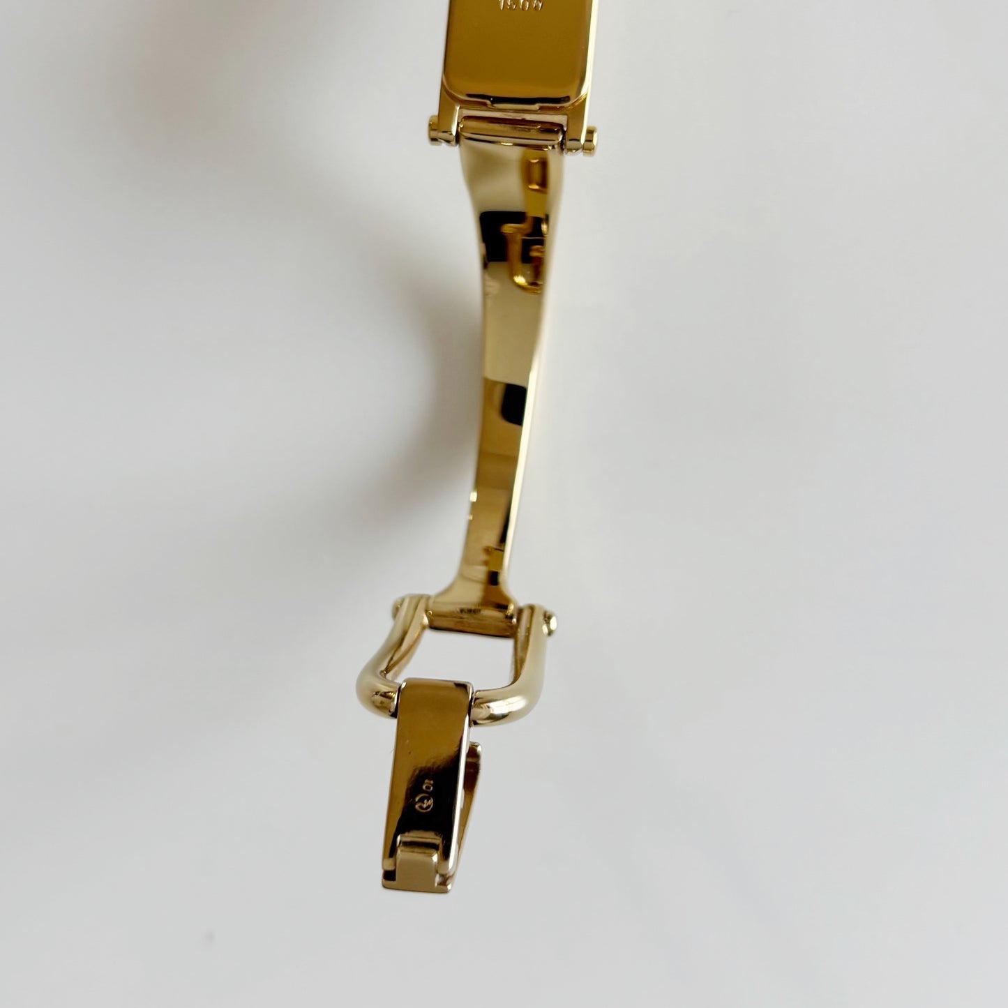 Gucci 1990s Cream Dial Rectangular Gold Plated Bangle Watch