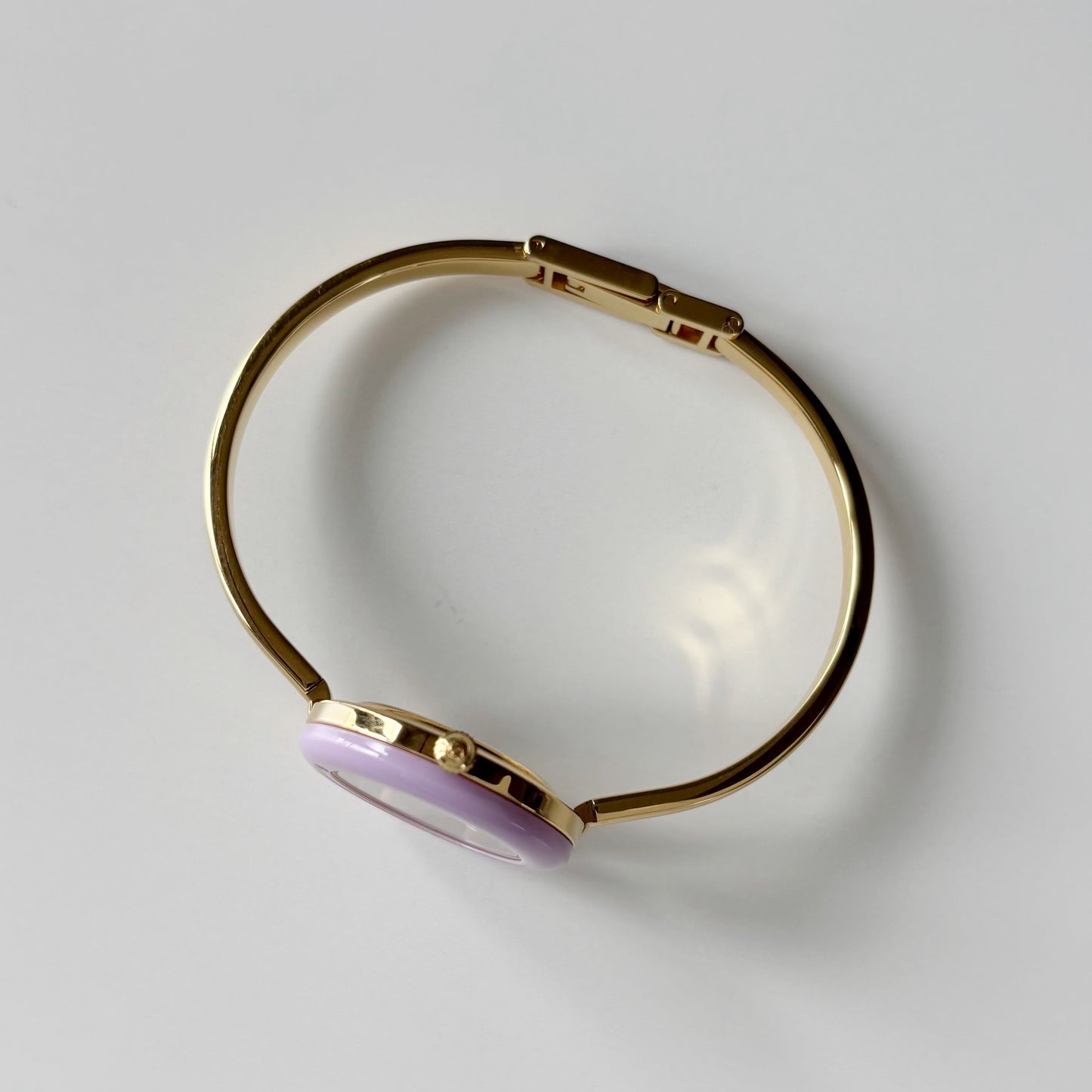 Gucci 1990s Interchangeable Bezel Gold Plated Bangle Watch with 12 bezels, case