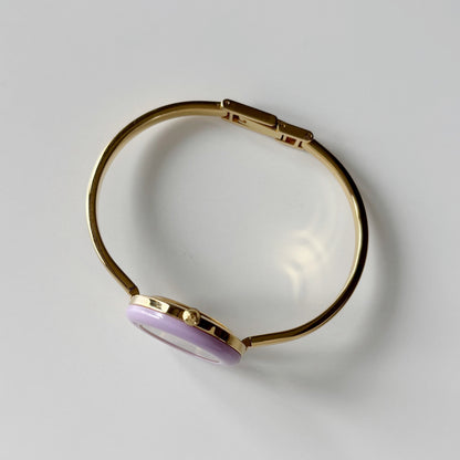 Gucci 1990s Interchangeable Bezel Gold Plated Bangle Watch with 12 bezels, case