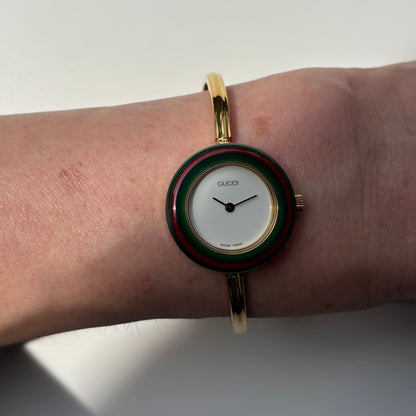 Gucci 1990s Interchangeable Bezel Gold Plated Bangle Watch with 12 bezels, case