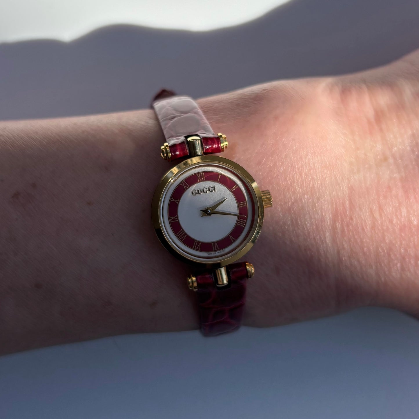 Gucci 1990s Red Dial Sherry Gold Plated Watch