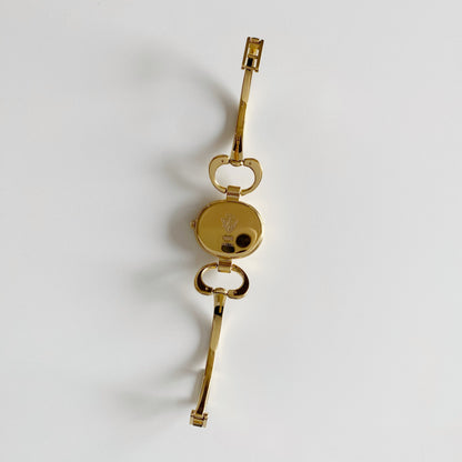 Gucci 1990s Black Dial Gold Plated Bangle Watch