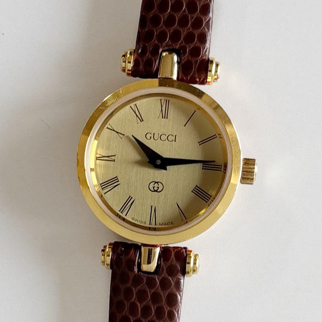 Gucci 1990s Round Gold Dial Gold Plated Watch