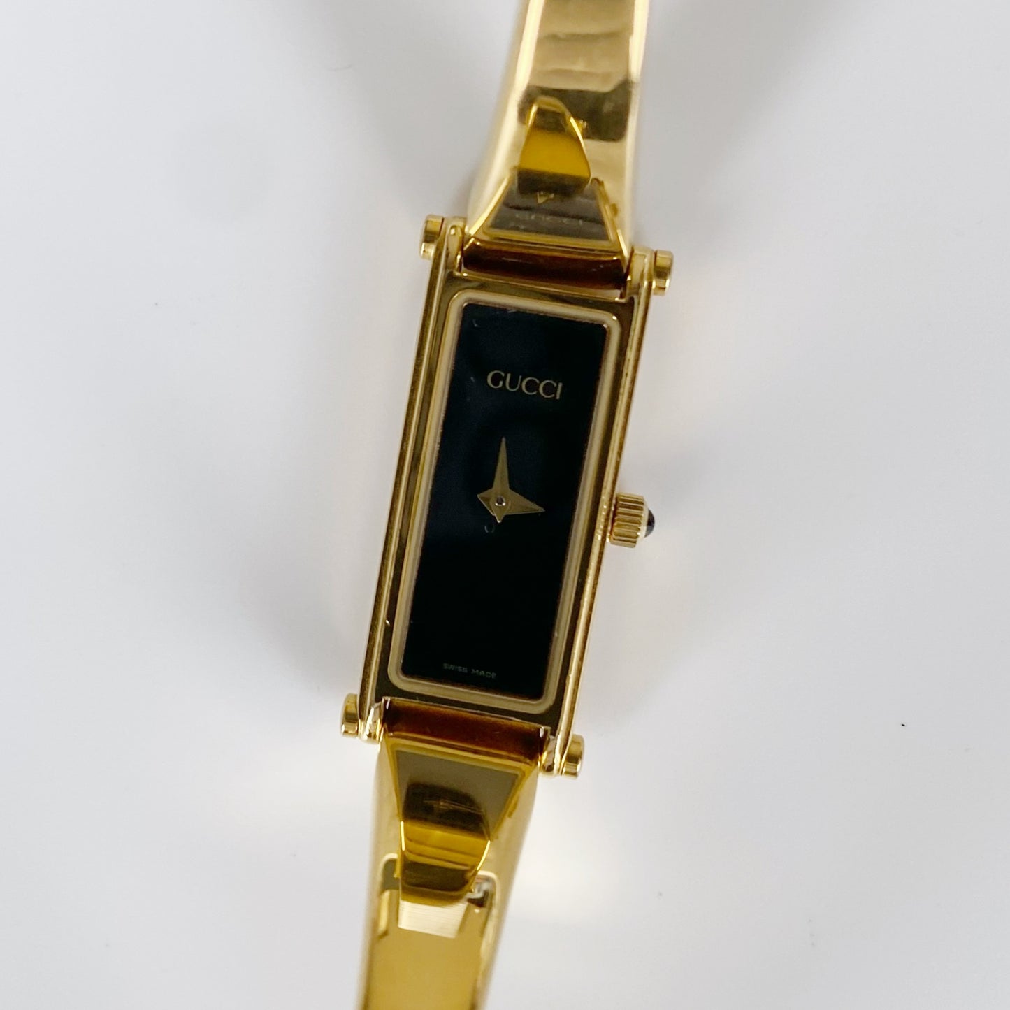 Gucci 1990s Black Dial Rectangular Gold Plated Bangle Watch