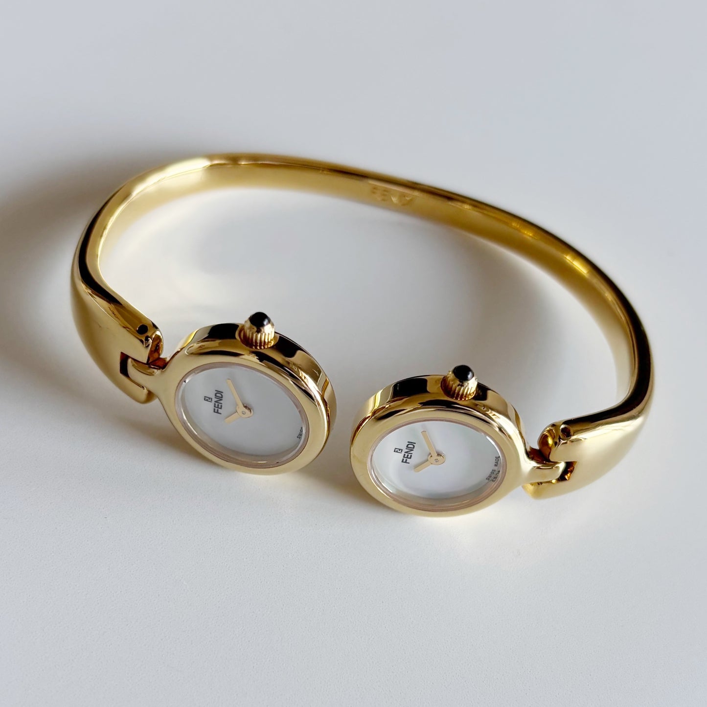 Fendi 1990s Seashell Dial Two Time Zone Gold Plated Bangle Watch