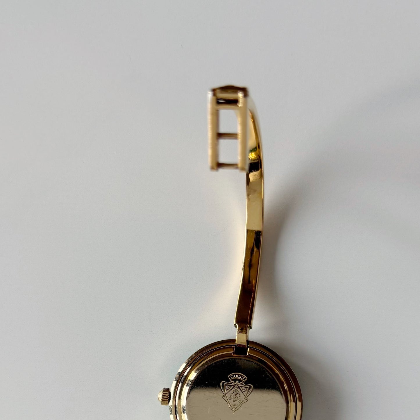 Gucci 1990s Interchangeable Bezel Gold Plated Bangle Watch with 12 bezels, case