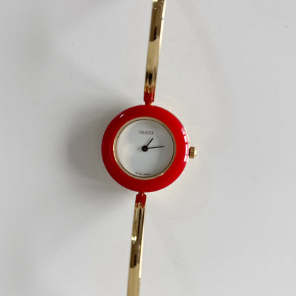 Gucci 1990s Interchangeable Bezel Gold Plated Bangle Watch with case, 12 bezels (Small)