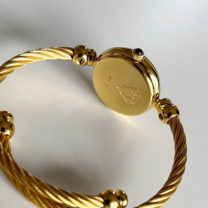 Gucci 1990s Black Dial Gold Plated Cable Band Bangle Watch