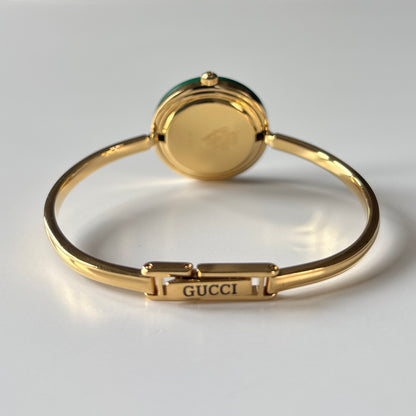 Gucci 1990s Interchangeable Bezel Gold Plated Bangle Watch with 12 bezels, case