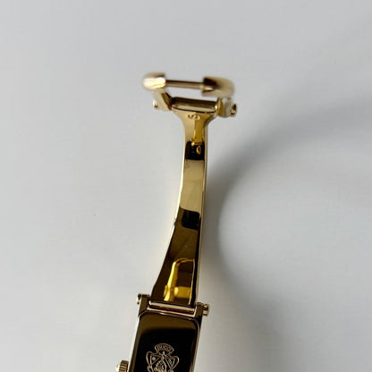 Gucci 1990s Rectangular Gold Dial Gold Plated Bangle Watch (Small)