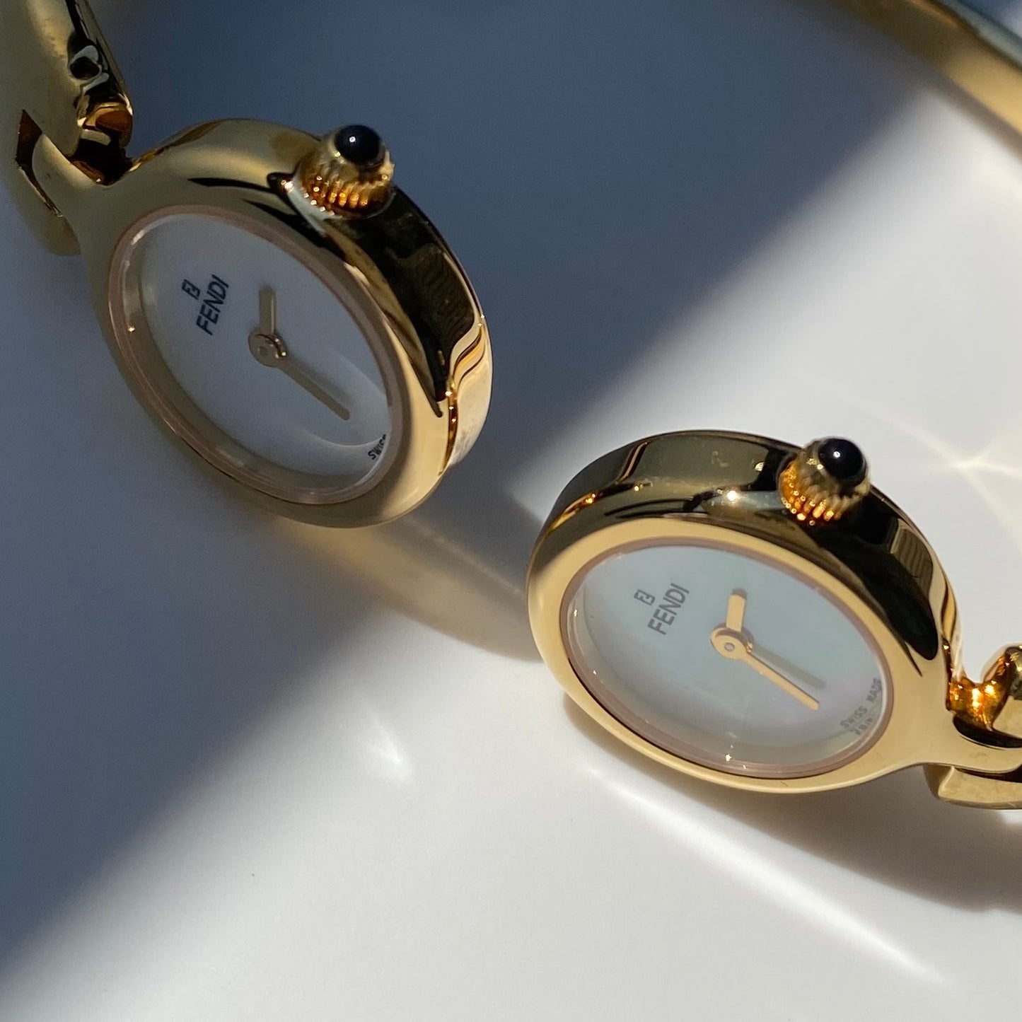 Fendi 1990s Seashell Dial Two Time Zone Gold Plated Bangle Watch