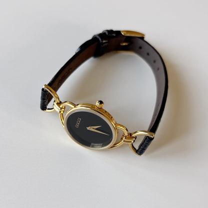 Gucci 1990s Black Round Dial Horsebit Gold Plated Watch