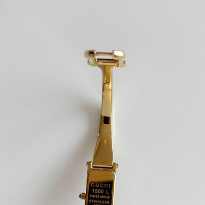 Gucci 1990s Rectangular Gold Dial Gold Plated Bangle Watch