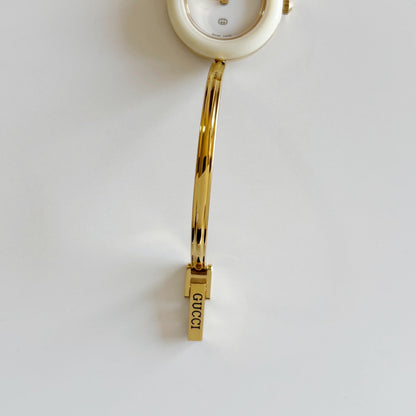 Gucci 1990s Interchangeable Bezel Gold Plated Bangle Watch with 12 bezels, case