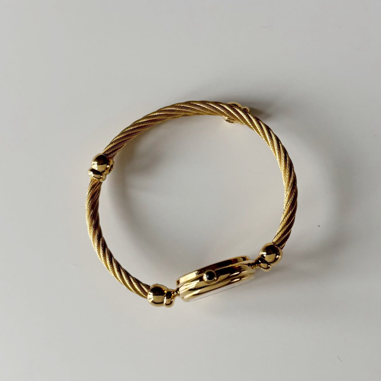Gucci 1990s Black Dial Gold Plated Cable Bangle Watch