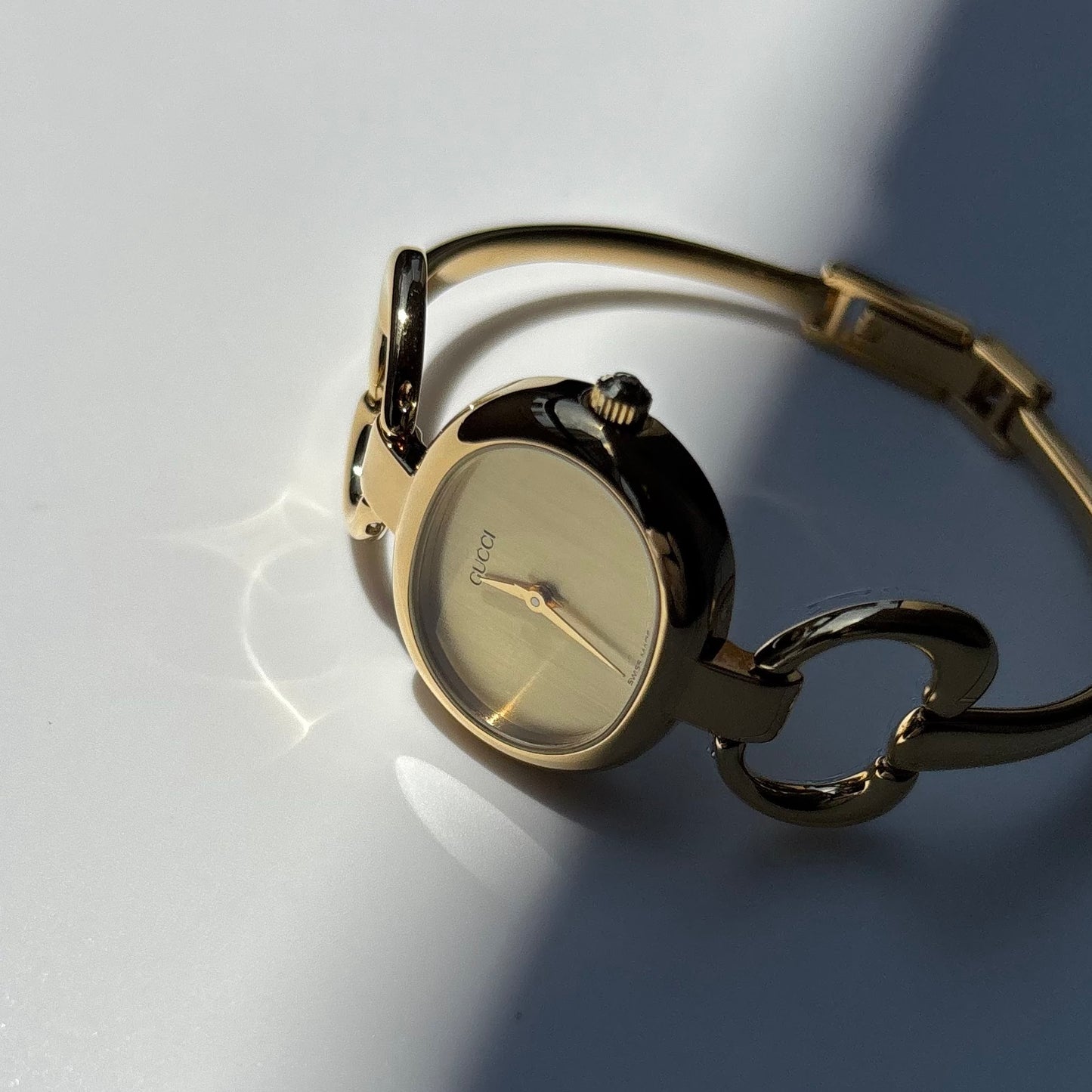 Gucci 1990s Oval Dial Gold Plated Bangle Watch