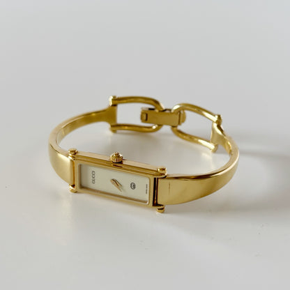 Gucci 1990s Cream Dial Rectangular Gold Plated Bangle Watch