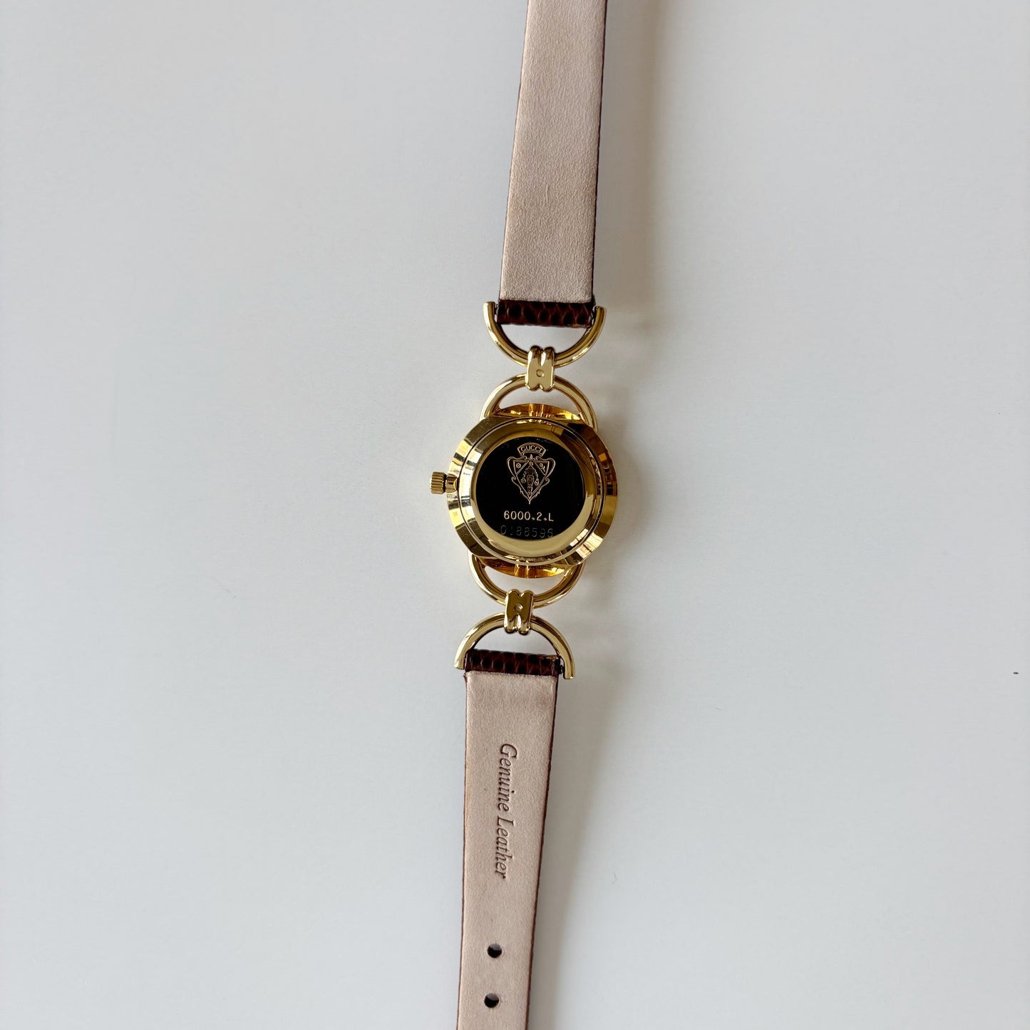 Gucci 1990s Round Cream Dial Horsebit Gold Plated Watch