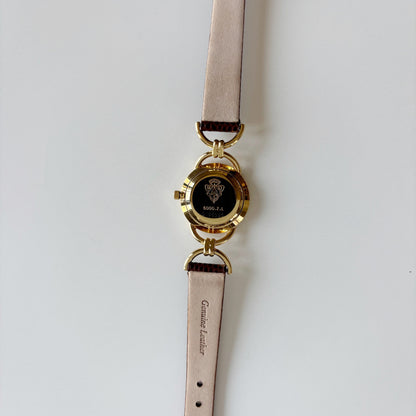 Gucci 1990s Round Cream Dial Horsebit Gold Plated Watch