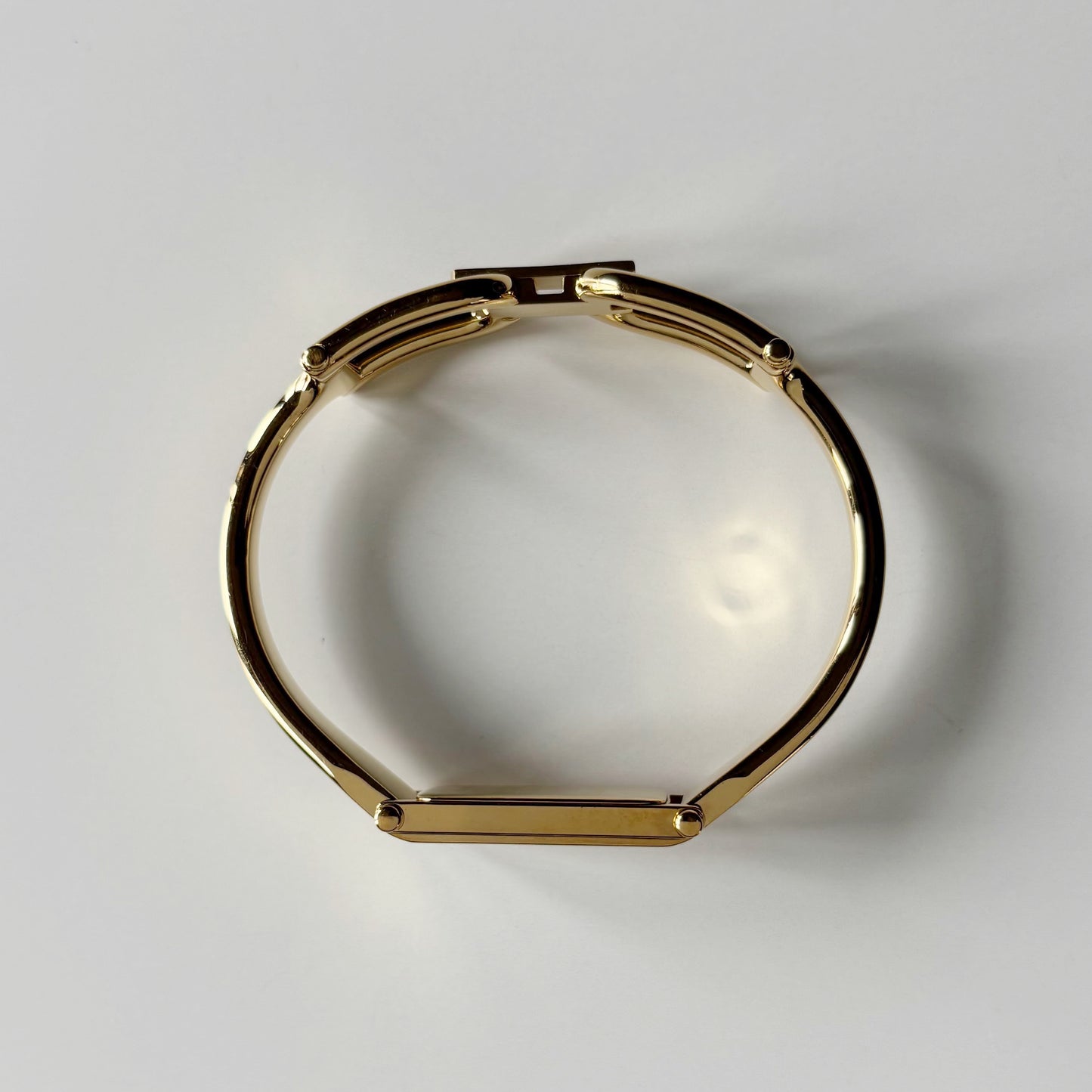 Gucci 1990s Seashell Rectangular Dial Gold Plated Bangle Watch