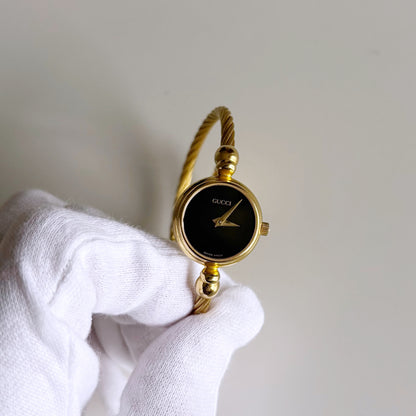 Gucci 1990s Black Dial Gold Plated Cable Bangle Watch