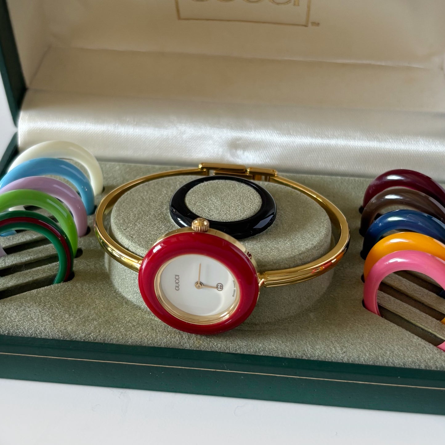 Gucci 1990s Interchangeable Bezel Gold Plated Bangle Watch with 12 bezels, case
