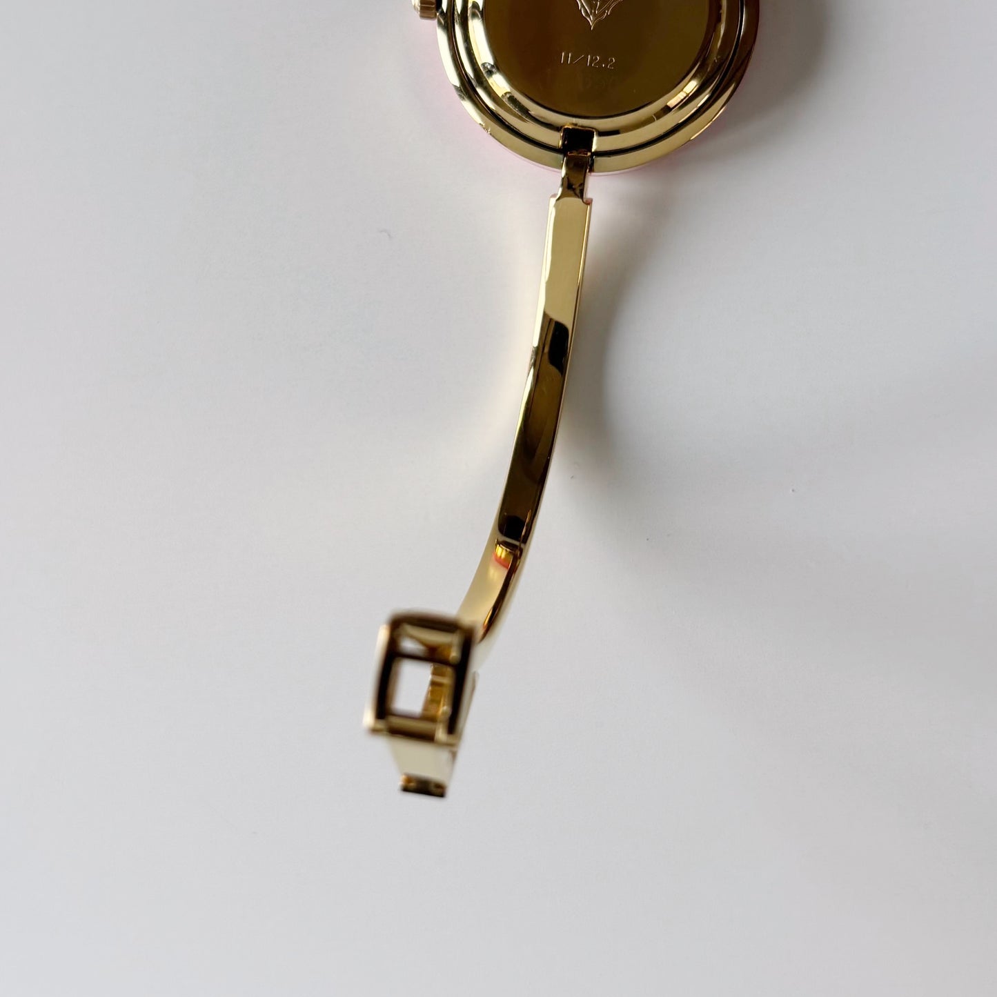 Gucci 1990s Interchangeable Bezel Gold Plated Bangle Watch with case, 12 bezels