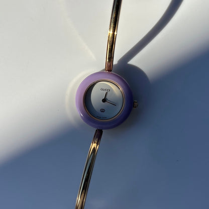 Gucci 1990s Interchangeable Bezel Gold Plated Bangle Watch with 12 bezels, case