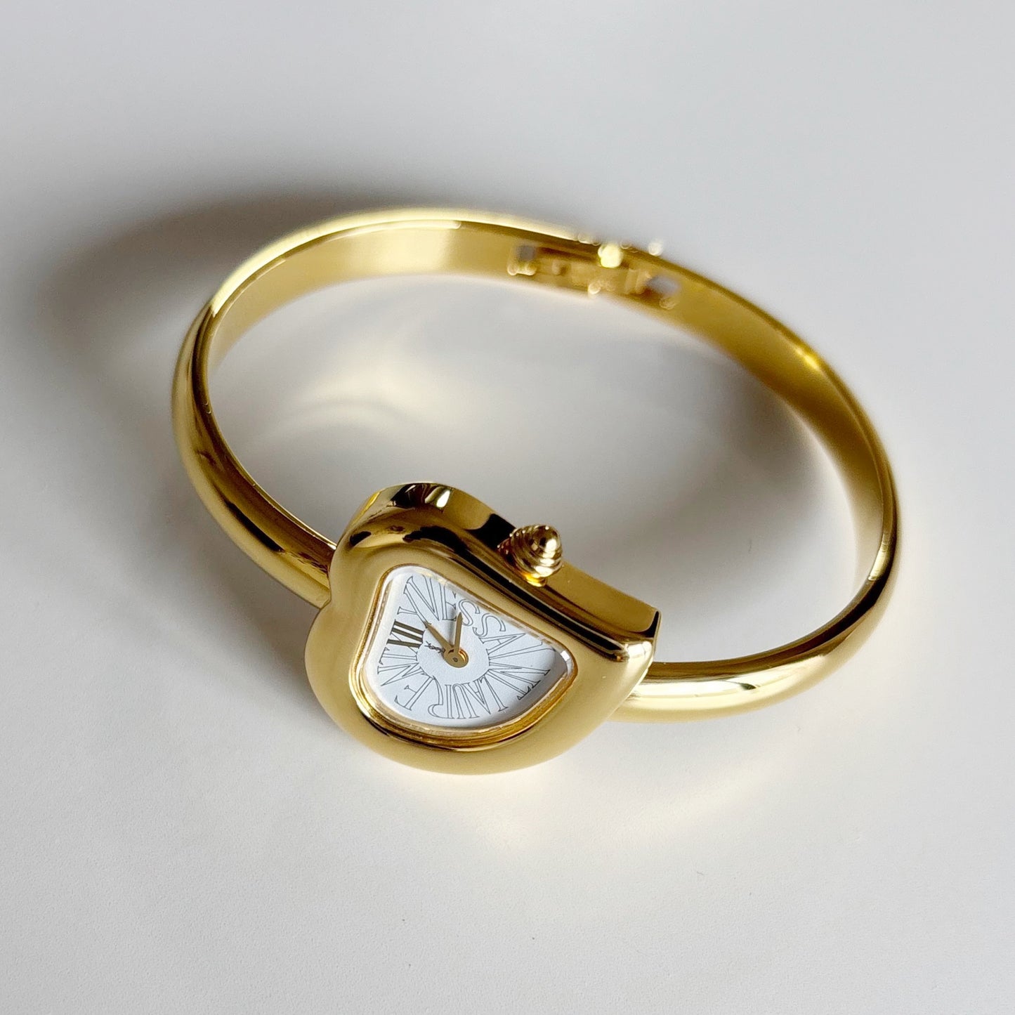 Yves Saint Laurent 1990s Heart Shaped Dial Gold Plated Bangle Watch