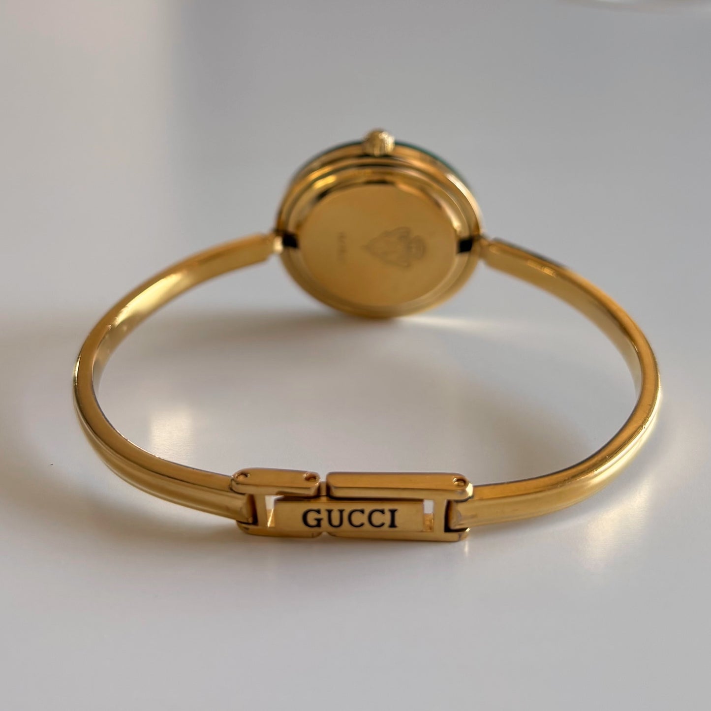 Gucci 1990s Interchangeable Bezel Gold Plated Bangle Watch with 12 bezels, case