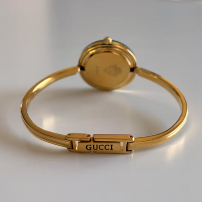 Gucci 1990s Interchangeable Bezel Gold Plated Bangle Watch with 12 bezels, case