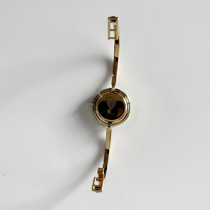 Gucci 1990s Interchangeable Bezel Gold Plated Bangle Watch with 12 bezels, case