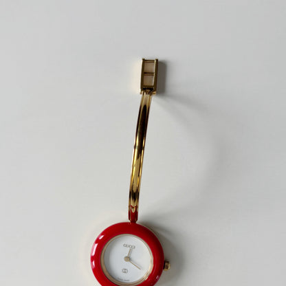 Gucci 1990s Interchangeable Bezel Gold Plated Bangle Watch with 12 bezels, case