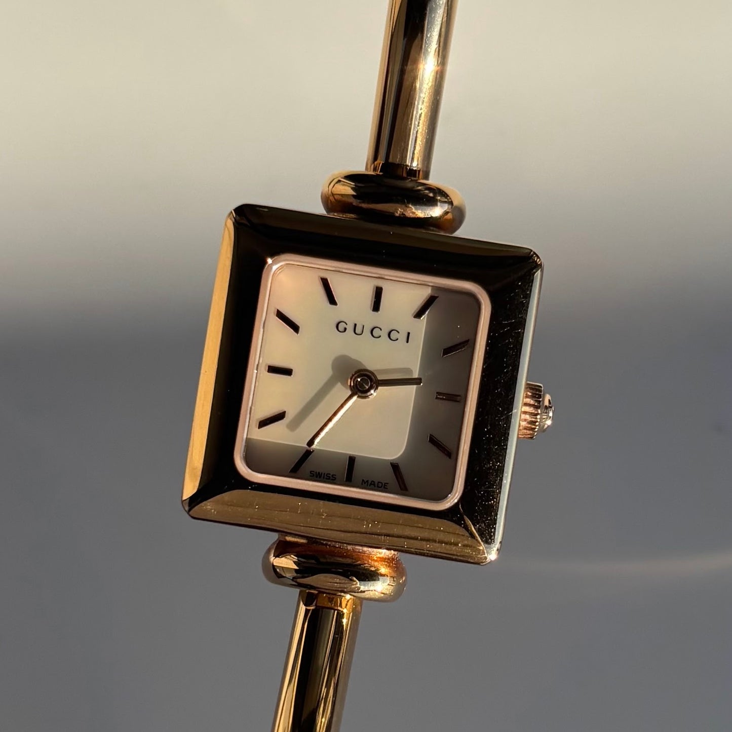 Gucci 1990s Seashell Square Dial Gold Plated Bangle Watch