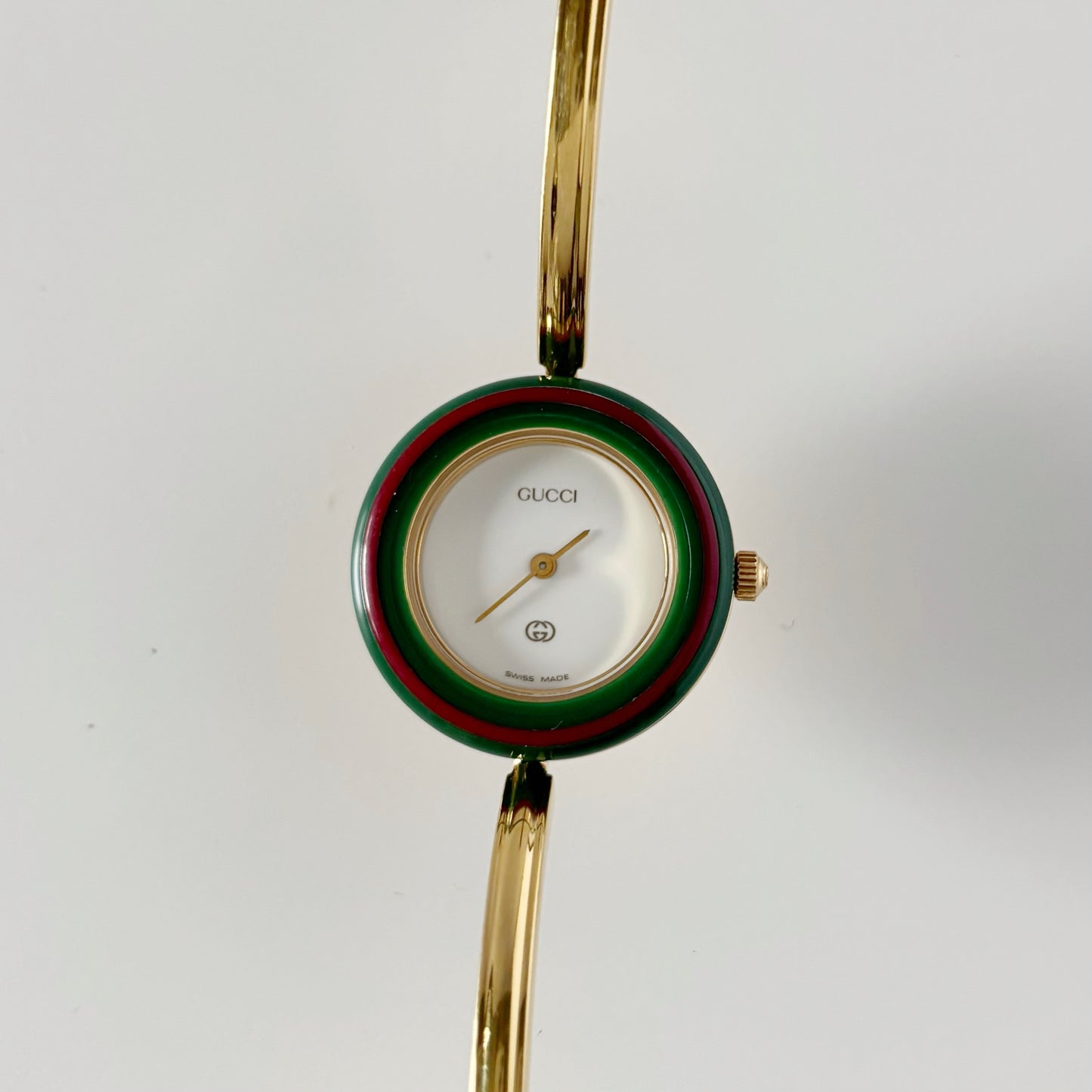Gucci 1990s Interchangeable Bezel Gold Plated Bangle Watch with 12 bezels, case