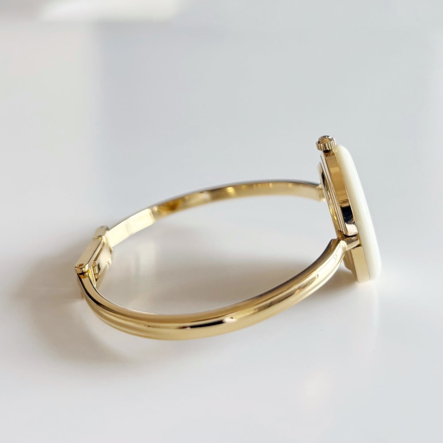 Gucci 1990s Interchangeable Bezel Gold Plated Bangle Watch with 12 bezels, case