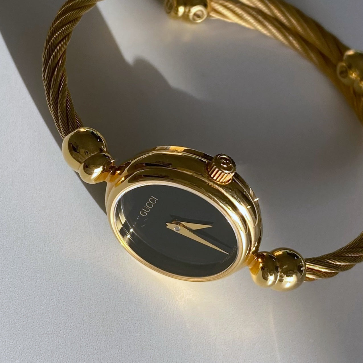 Gucci 1990s Black Dial Gold Plated Bangle Watch