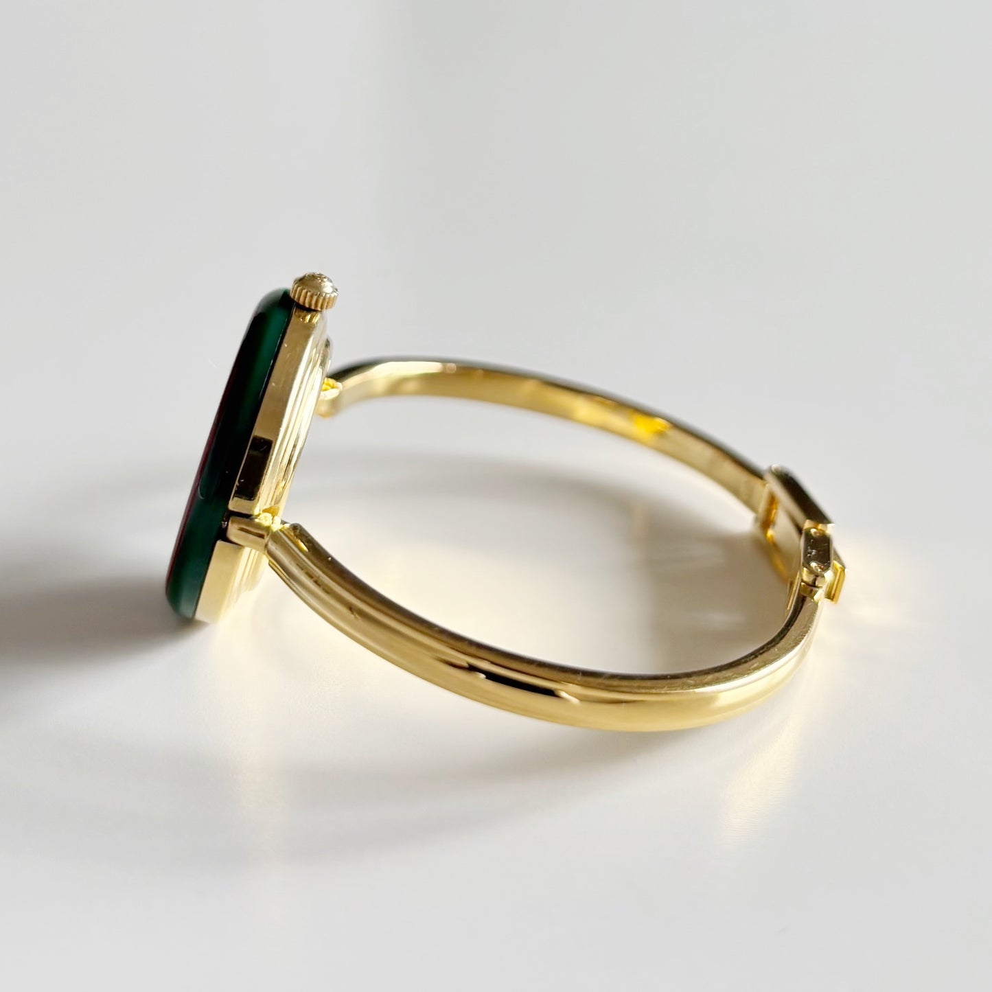 Gucci 1990s Interchangeable Bezel Gold Plated Bangle Watch with 12 bezels, case (Small)