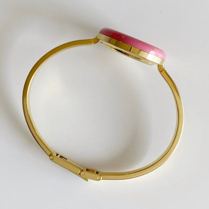 Gucci 1990s Interchangeable Bezel Gold Plated Bangle Watch with 12 bezels, case
