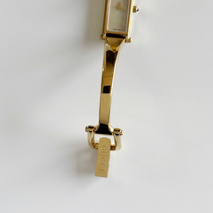 Gucci 1990s Seashell Dial Rectangular Gold Plated Bangle Watch
